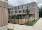 Studierendenwohnheim in München, Sintpertstraße, Blick in den Innenhof mit Kita-Freibereich